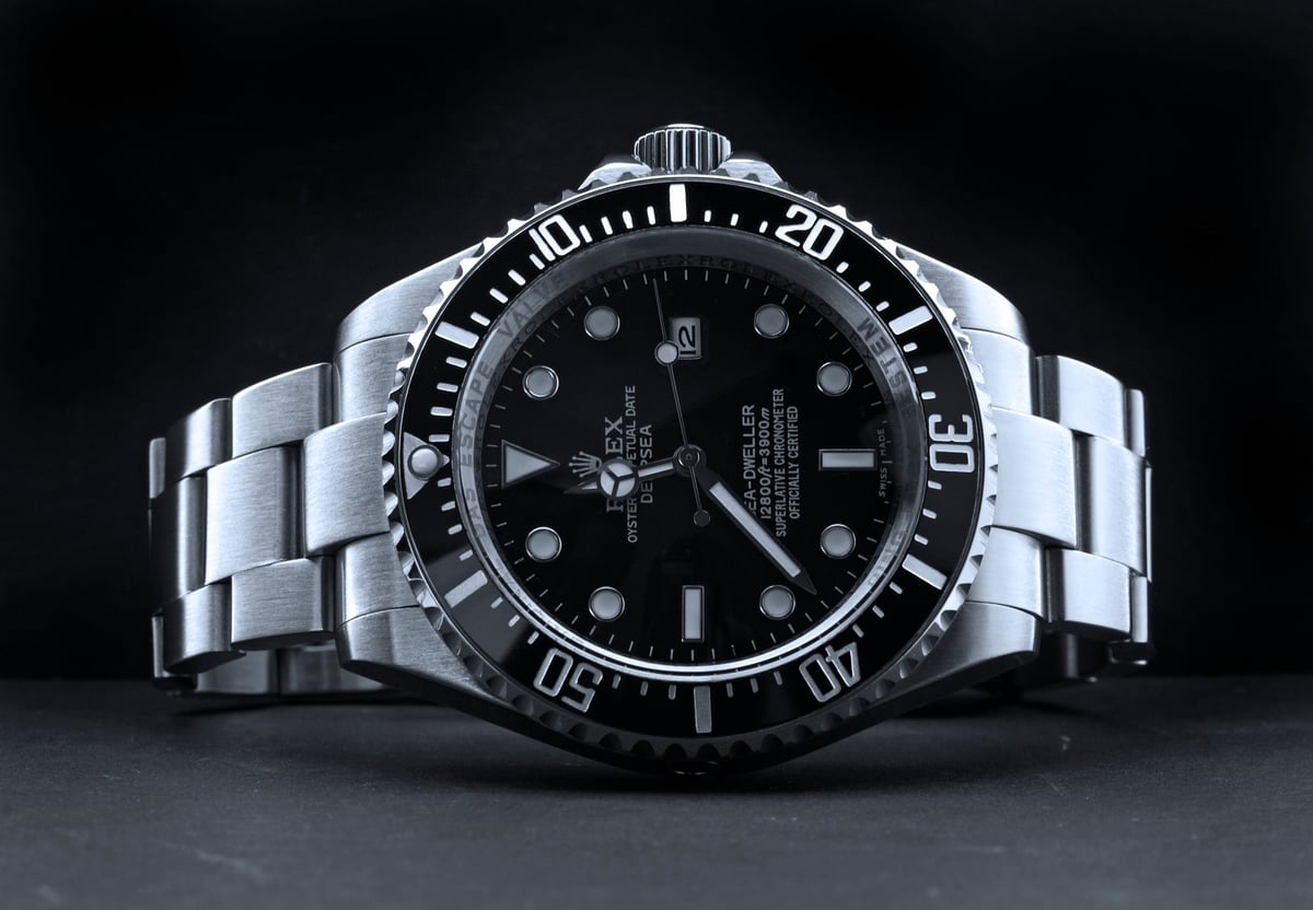 Rolex Deepsea luxury dive watch in studio lighting against a black background